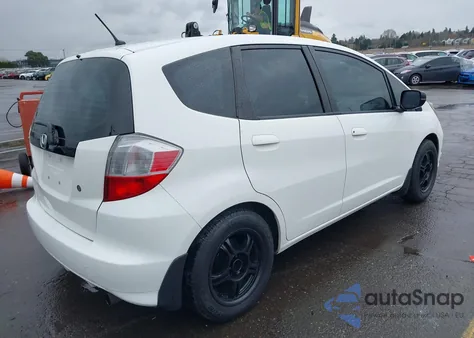 2009 Honda Fit from USA, damaged, VIN JHMGE88299S057074